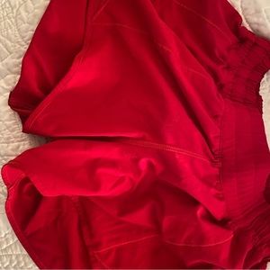 Red Lululemon shorts